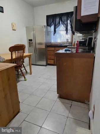 a room with furniture a washer and dryer