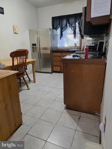 a room with furniture a washer and dryer