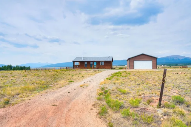 a view of balcony with wooden floor