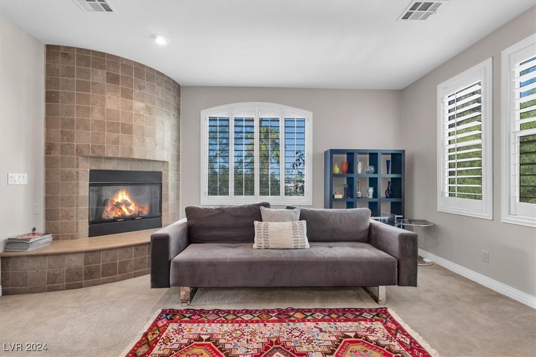11348 La Madre Ridge Drive Las Vegas, NV 89135 - Photo 29 of 75 Primary Suite w/ updated bathroom surrounds, dual walk-in closets, fireplace & balcony.