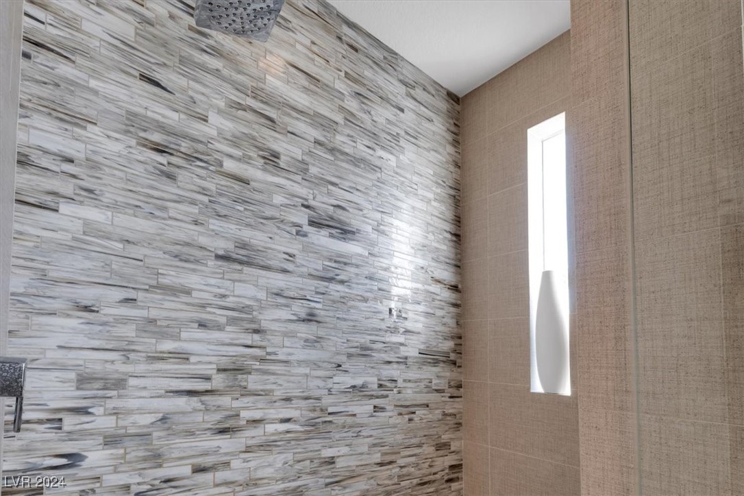 11348 La Madre Ridge Drive Las Vegas, NV 89135 - Photo 36 of 75 Primary Suite w/ updated bathroom surrounds, and dual walk-in closets.