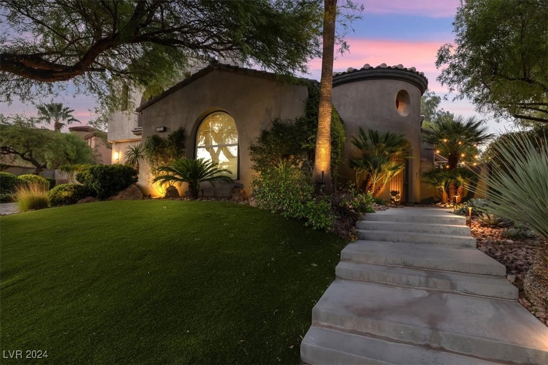 11348 La Madre Ridge Drive Las Vegas, NV 89135 - Photo 38 of 75 One of the largest lots in guard gated Red Rock Country Club East. Newly installed faux lawn, with mature landscaping.