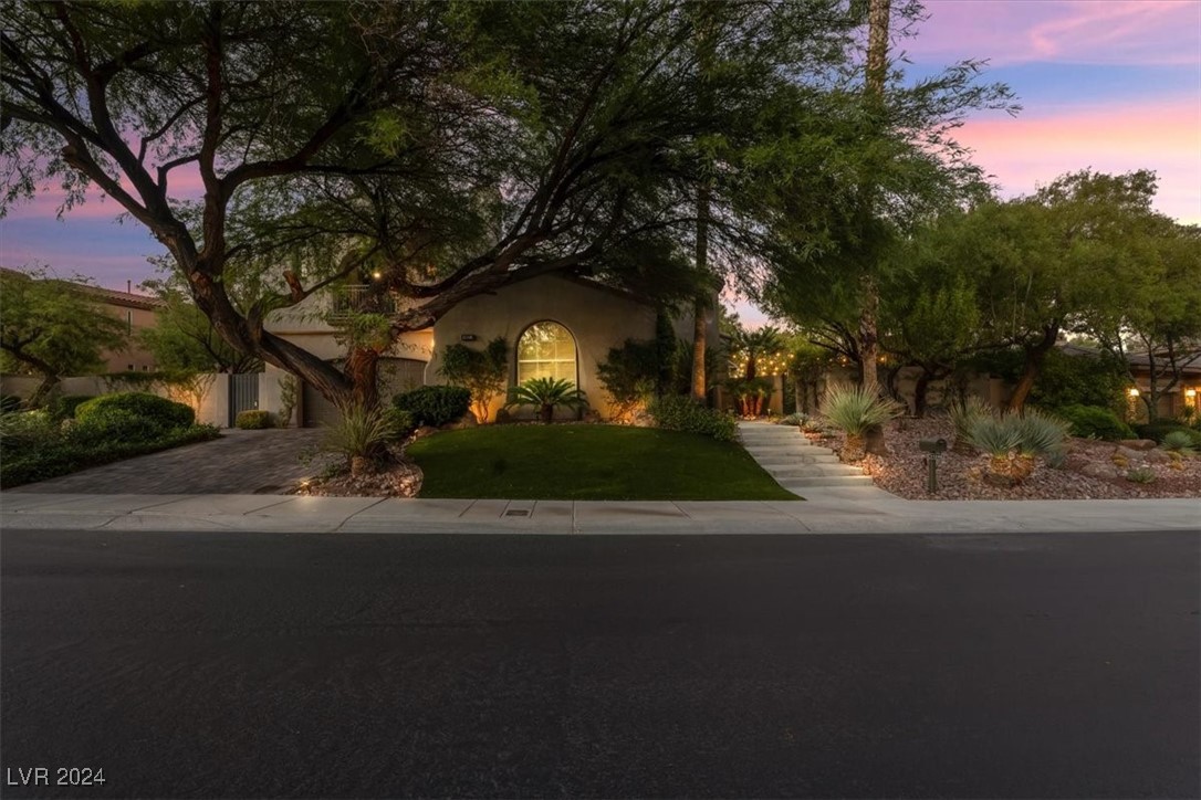 11348 La Madre Ridge Drive Las Vegas, NV 89135 - Photo 39 of 75 One of the largest lots in guard gated Red Rock Country Club East. Newly installed faux lawn, with mature landscaping.