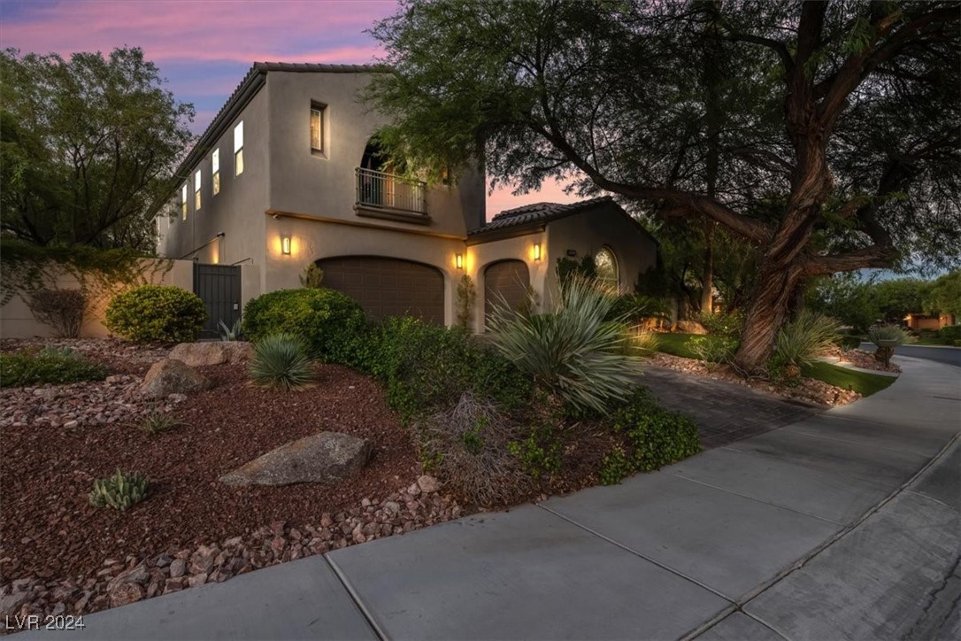 11348 La Madre Ridge Drive Las Vegas, NV 89135 - Photo 40 of 75 One of the largest lots in guard gated Red Rock Country Club East. Impressive curb appeal with mature landscaping.