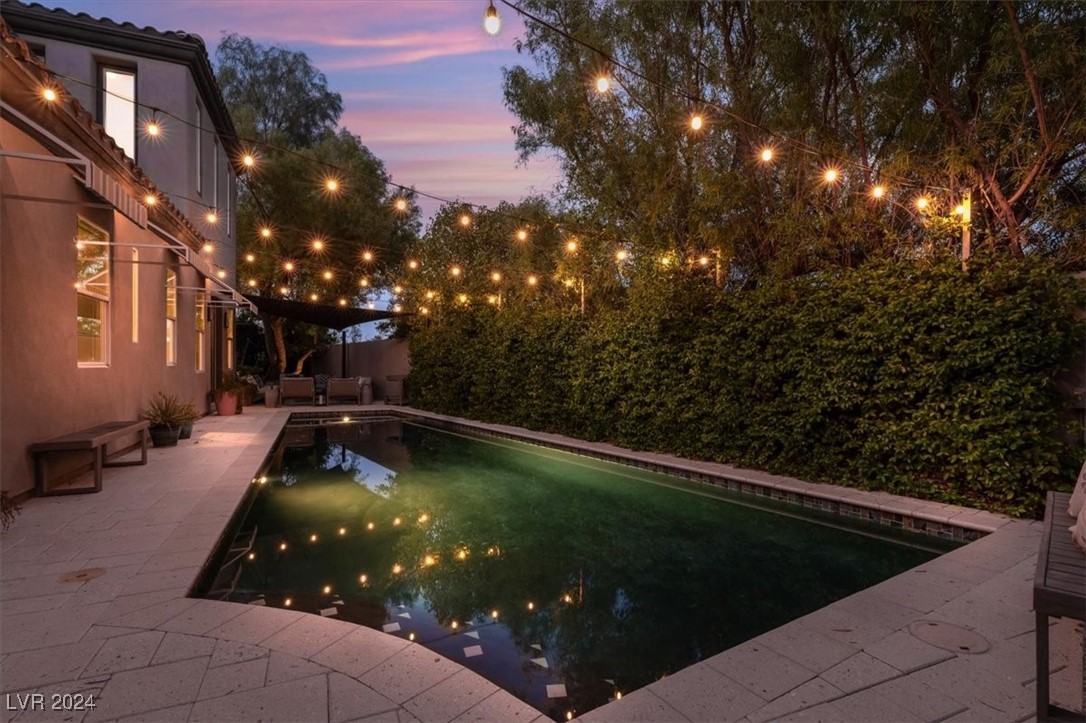 11348 La Madre Ridge Drive Las Vegas, NV 89135 - Photo 44 of 75 Secluded Pool & Spa with tranquil lighting, updated tile, and shellock paver decking.