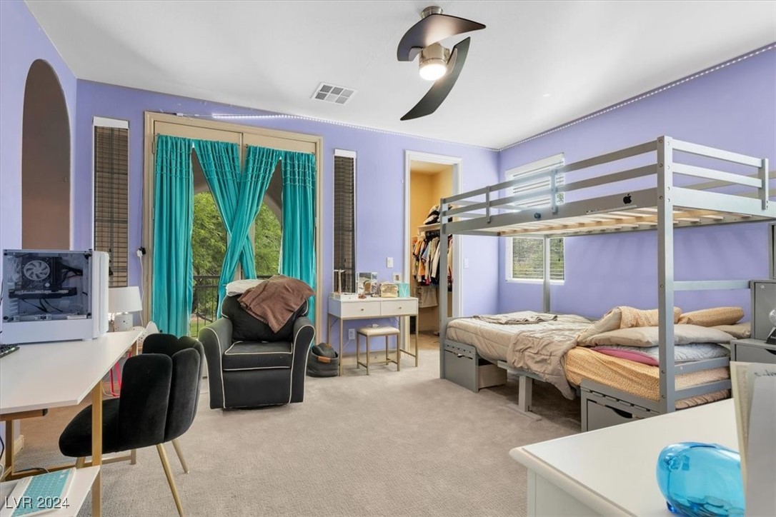 11348 La Madre Ridge Drive Las Vegas, NV 89135 - Photo 48 of 75 Bedroom with ensuite bathroom and balcony.