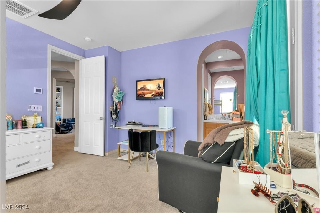 11348 La Madre Ridge Drive Las Vegas, NV 89135 - Photo 49 of 75 Bedroom with ensuite bathroom and balcony.