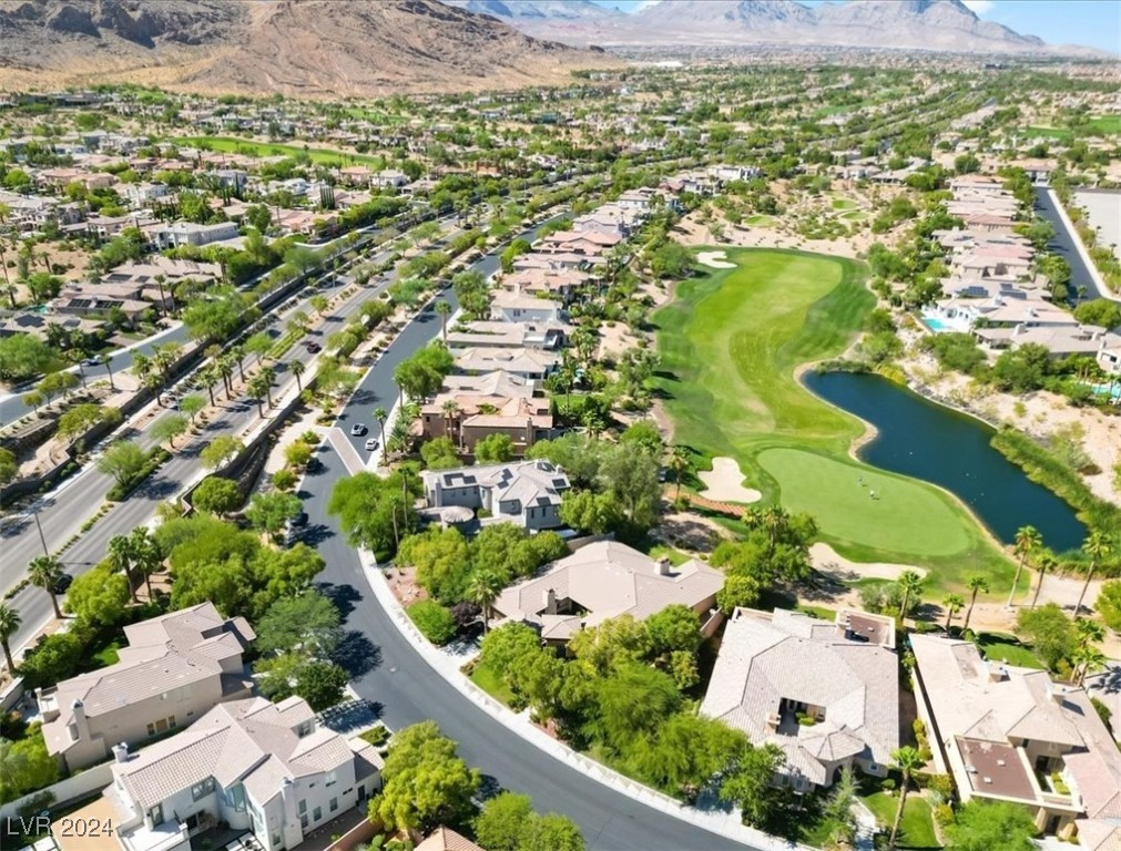 11348 La Madre Ridge Drive Las Vegas, NV 89135 - Photo 63 of 75 One of the largest lots in guard gated Red Rock Country Club East, golf front on the 10th hole of Private Mountain Course, w/ golf & lake views.