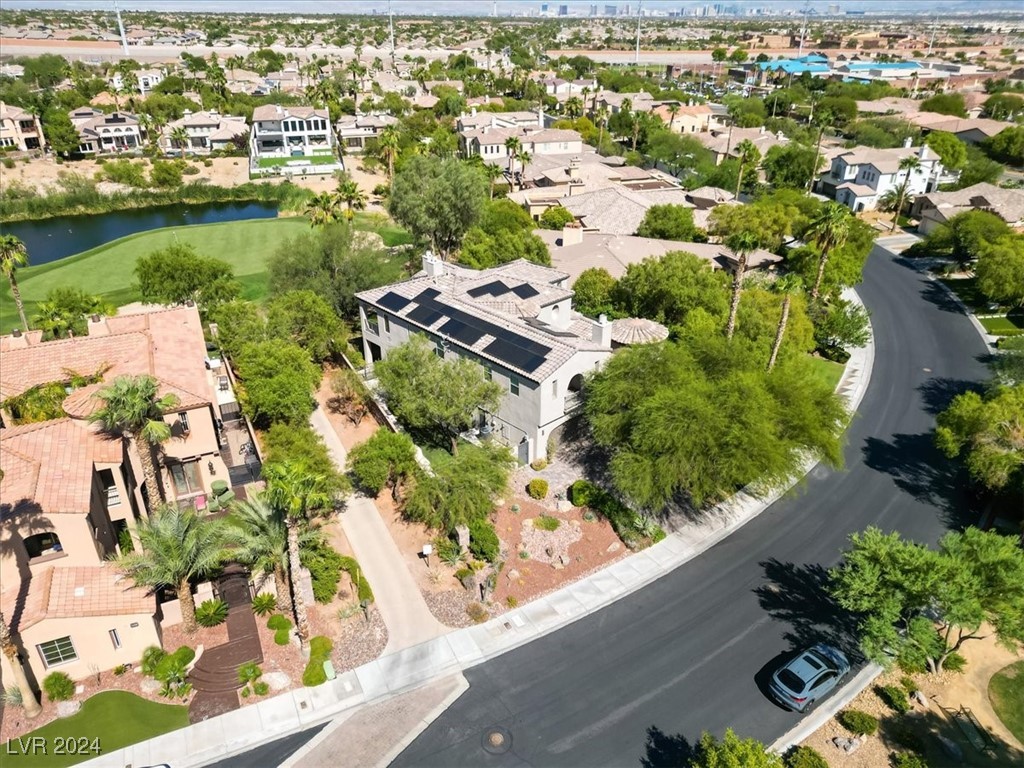 11348 La Madre Ridge Drive Las Vegas, NV 89135 - Photo 64 of 75 Uniquely located across from a park, and cart path to the West of the home so your neighbor is farther away, and the neighbor to the East is a lower one story home for added privacy in your yard.