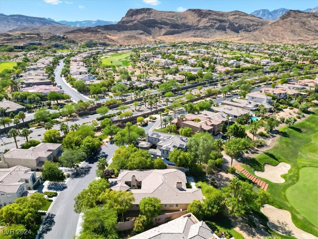 11348 La Madre Ridge Drive Las Vegas, NV 89135 - Photo 65 of 75 One of the largest lots in guard gated Red Rock Country Club East, golf front on the 10th hole of Private Mountain Course, w/ golf & lake views.