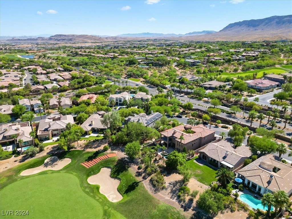 11348 La Madre Ridge Drive Las Vegas, NV 89135 - Photo 66 of 75 One of the largest lots in guard gated Red Rock Country Club East, golf front on the 10th hole of Private Mountain Course, w/ golf & lake views.