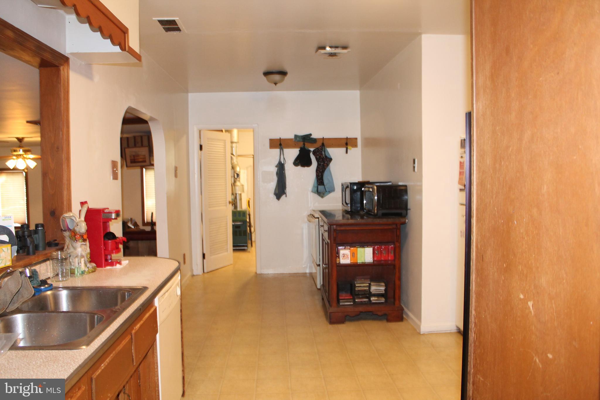 26 Taunton Road Medford, NJ 08055 - Photo 7 of 24 a view of a living room and bathroom
