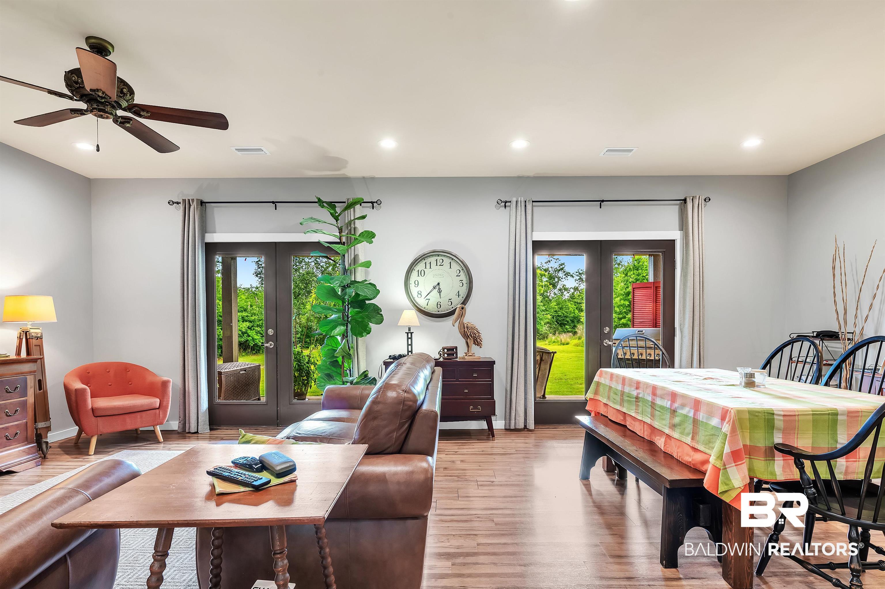 13827 County Road 83 Elberta, AL 36530 - Photo 14 of 38 Living area with french doors, plenty of natural light, recessed lighting, and wood finished floors