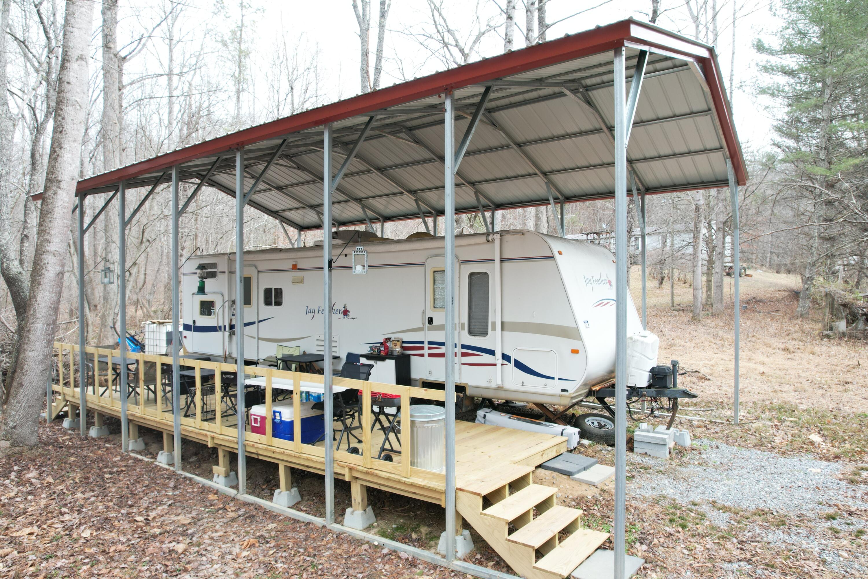 0 Carson Drive Ferrum, VA 24088 - Photo 5 of 60 a wooden deck with a white umbrella