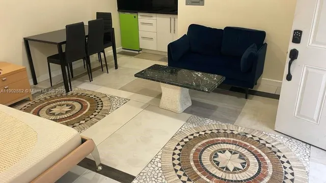 a view of entryway with washer and dryer