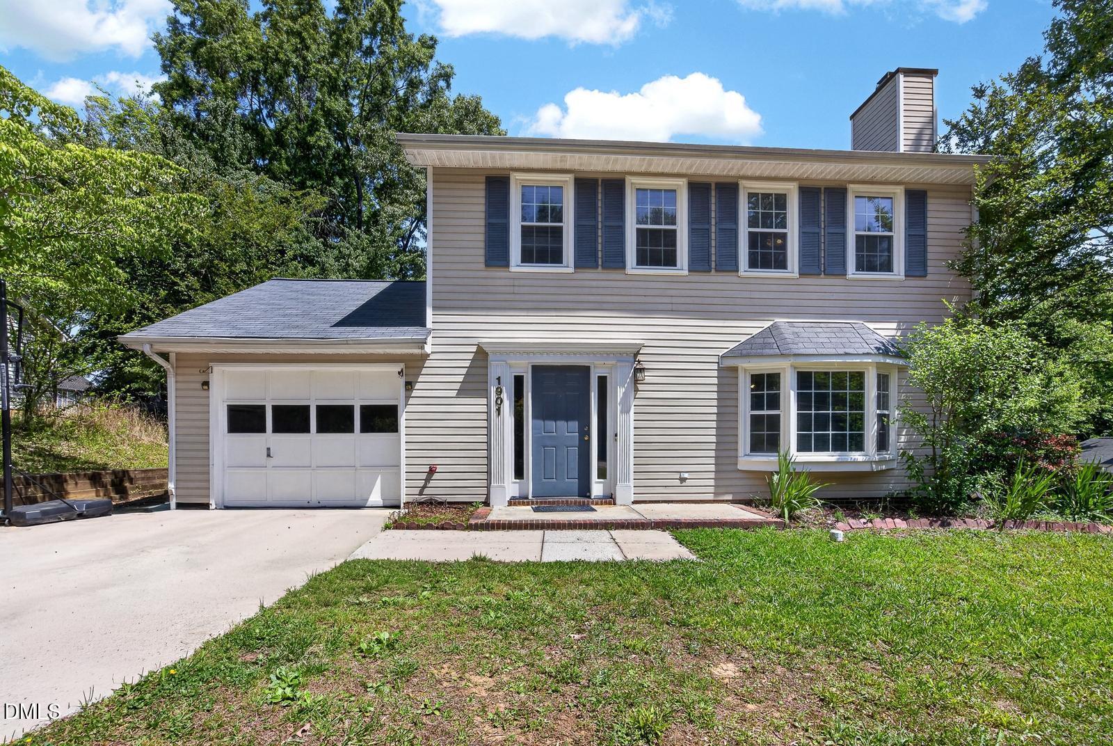 1901 Whites Mill Road High Point, NC 27265 - Photo 3 of 24 a front view of a house with a yard