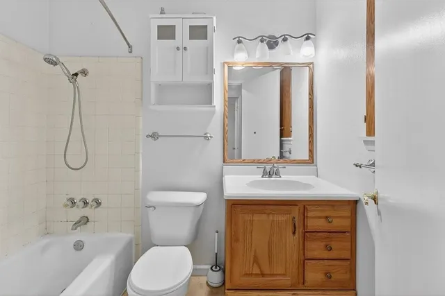 a view of room with window and ceiling fan