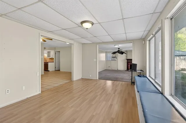 a view of an empty room and window