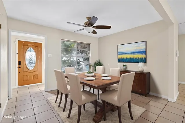 a view of a dining room with furniture