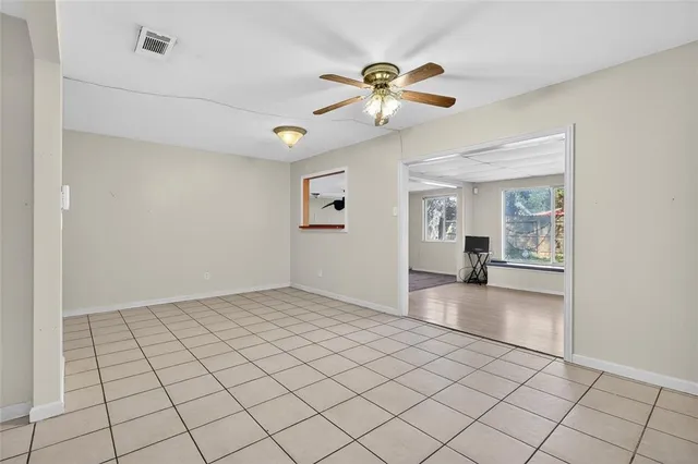 a kitchen with a sink cabinets and window