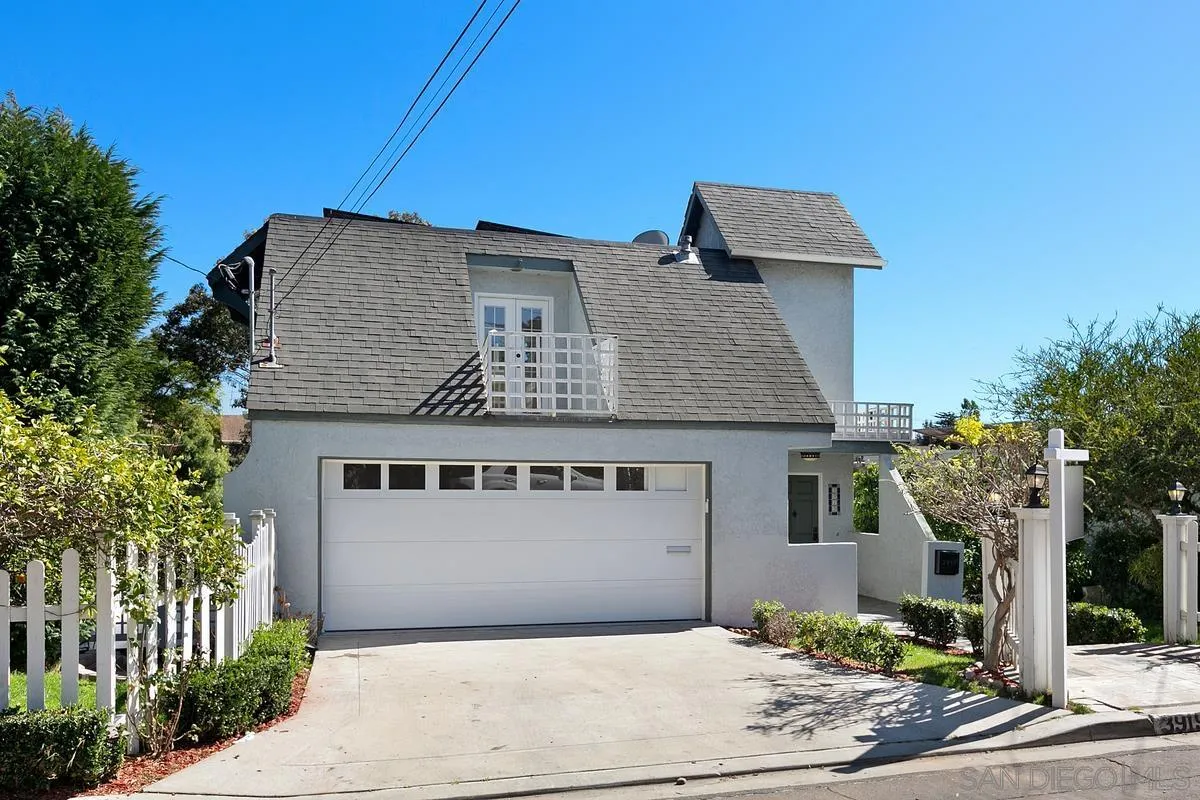 3919 Pringle Street San Diego, CA 92103 - Photo 1 of 37 a front view of a house with a yard