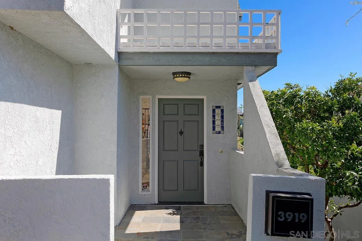 3919 Pringle Street San Diego, CA 92103 - Photo 12 of 37 a view of a wooden door of the house