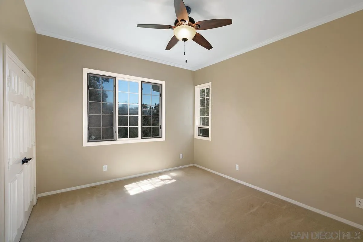 3919 Pringle Street San Diego, CA 92103 - Photo 20 of 37 an empty room with a window