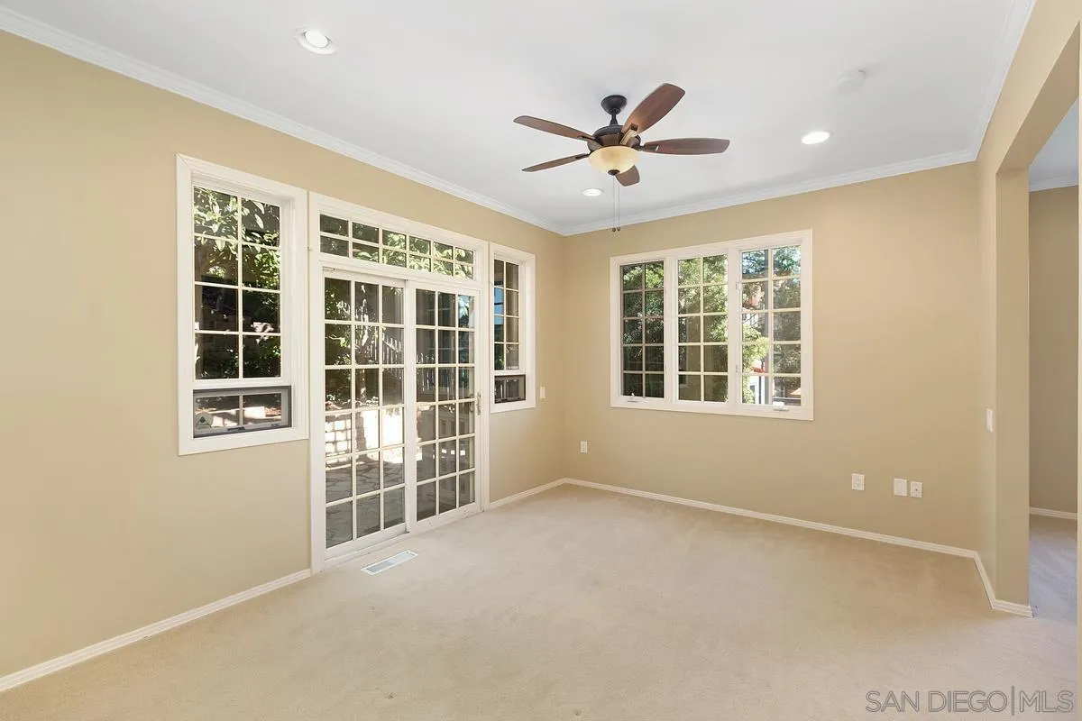 3919 Pringle Street San Diego, CA 92103 - Photo 23 of 37 a view of an empty room with a window