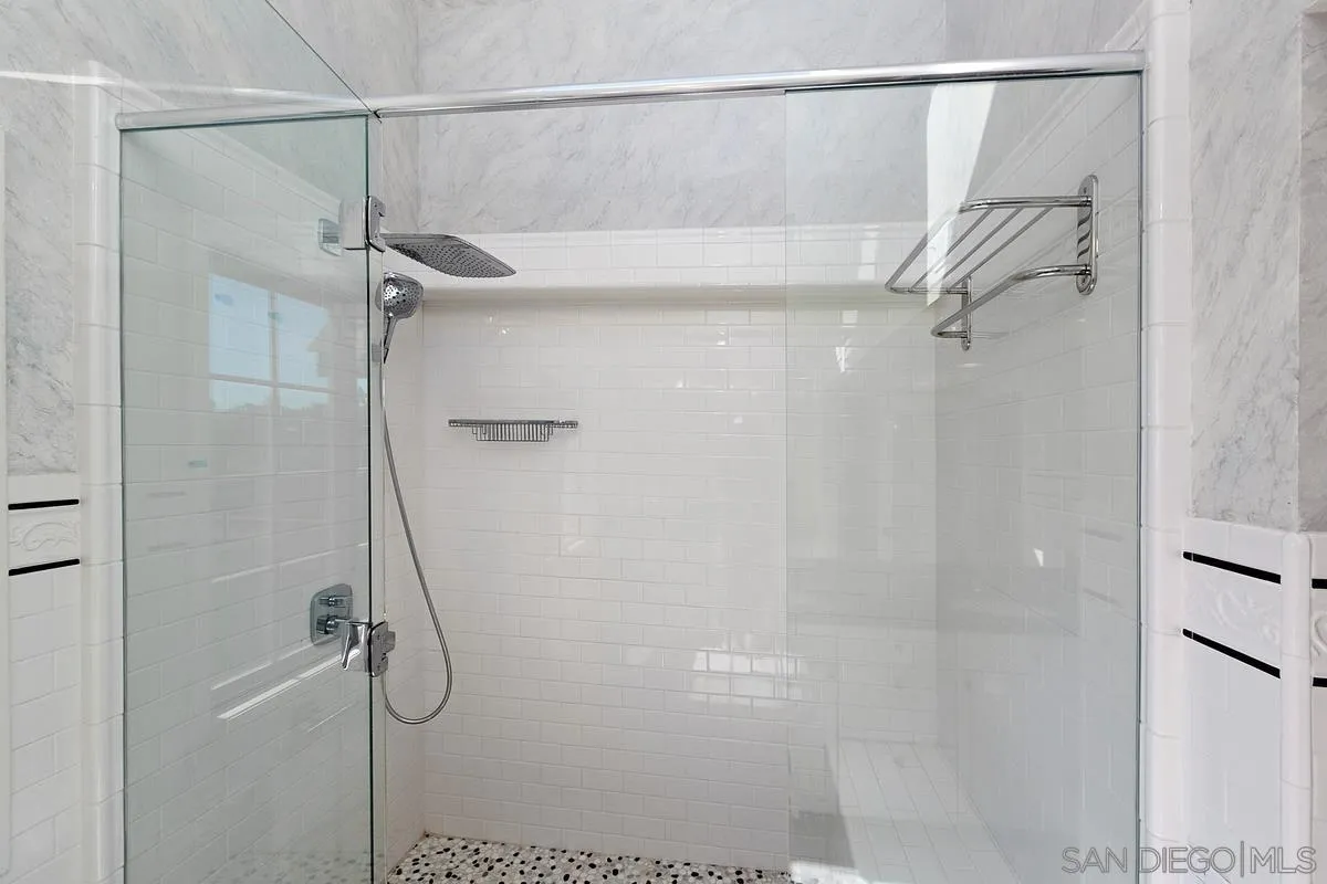 3919 Pringle Street San Diego, CA 92103 - Photo 29 of 37 a bathroom that has a shower in it