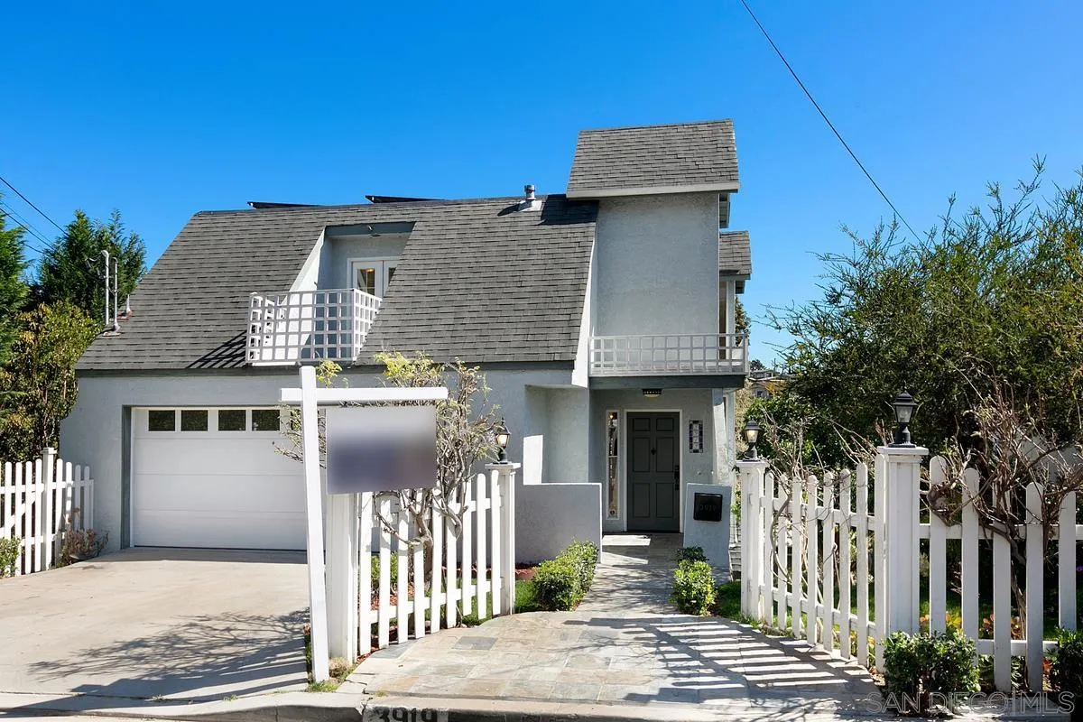 3919 Pringle Street San Diego, CA 92103 - Photo 34 of 37 a front view of a house with a garage