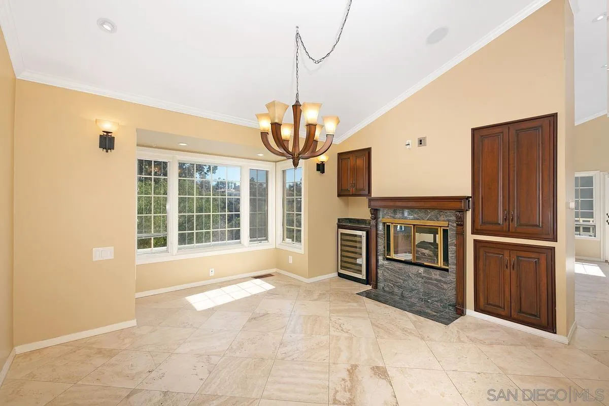 3919 Pringle Street San Diego, CA 92103 - Photo 7 of 37 a view of a kitchen with a sink and refrigerator