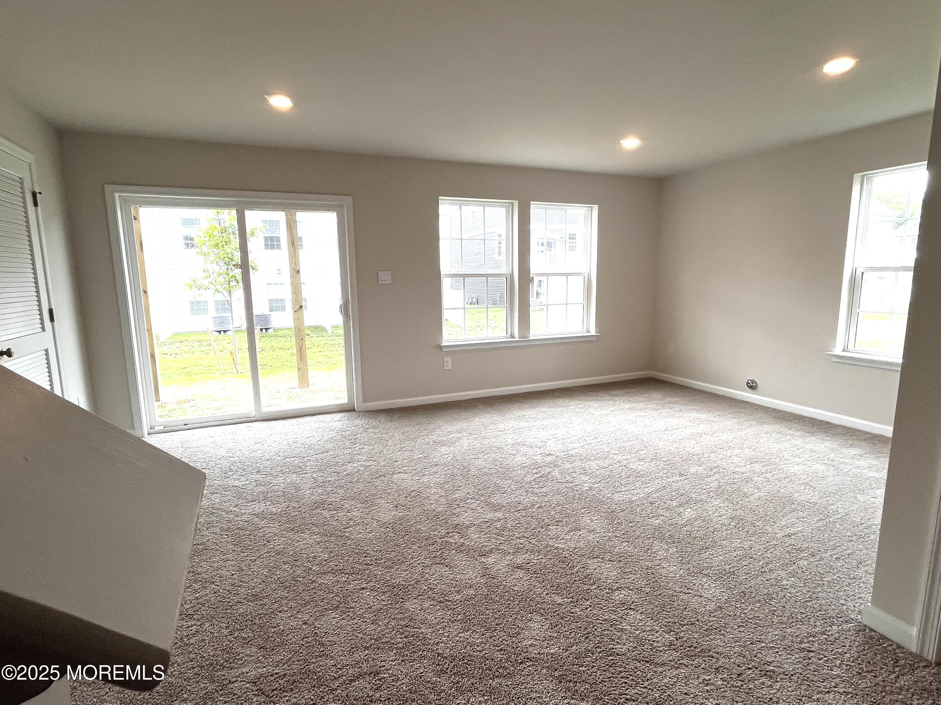 14 Rothbury Court Tinton Falls, NJ 07753 - Photo 24 of 28 a view of an empty room with a window