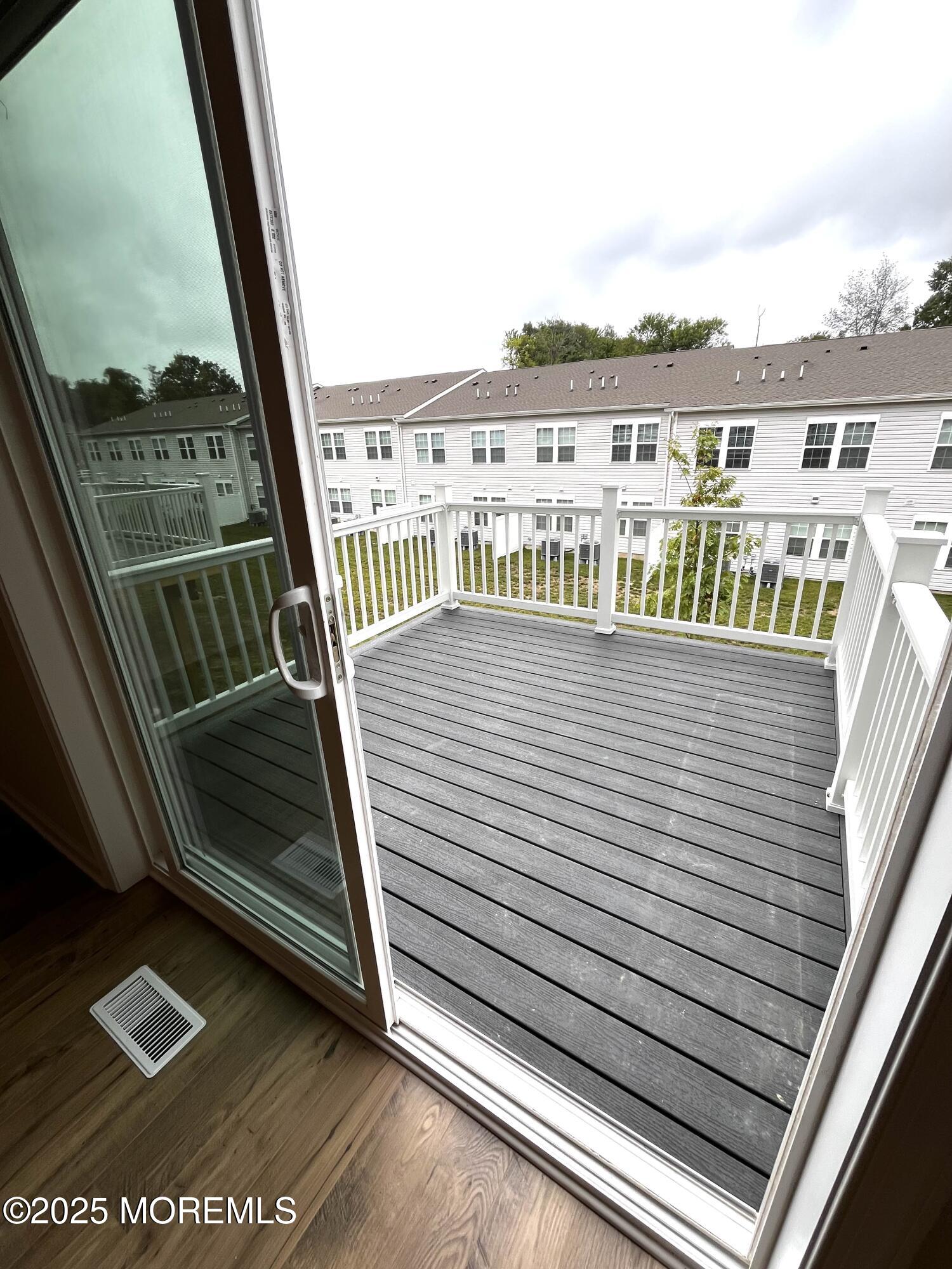 14 Rothbury Court Tinton Falls, NJ 07753 - Photo 4 of 28 a view of a balcony with city view