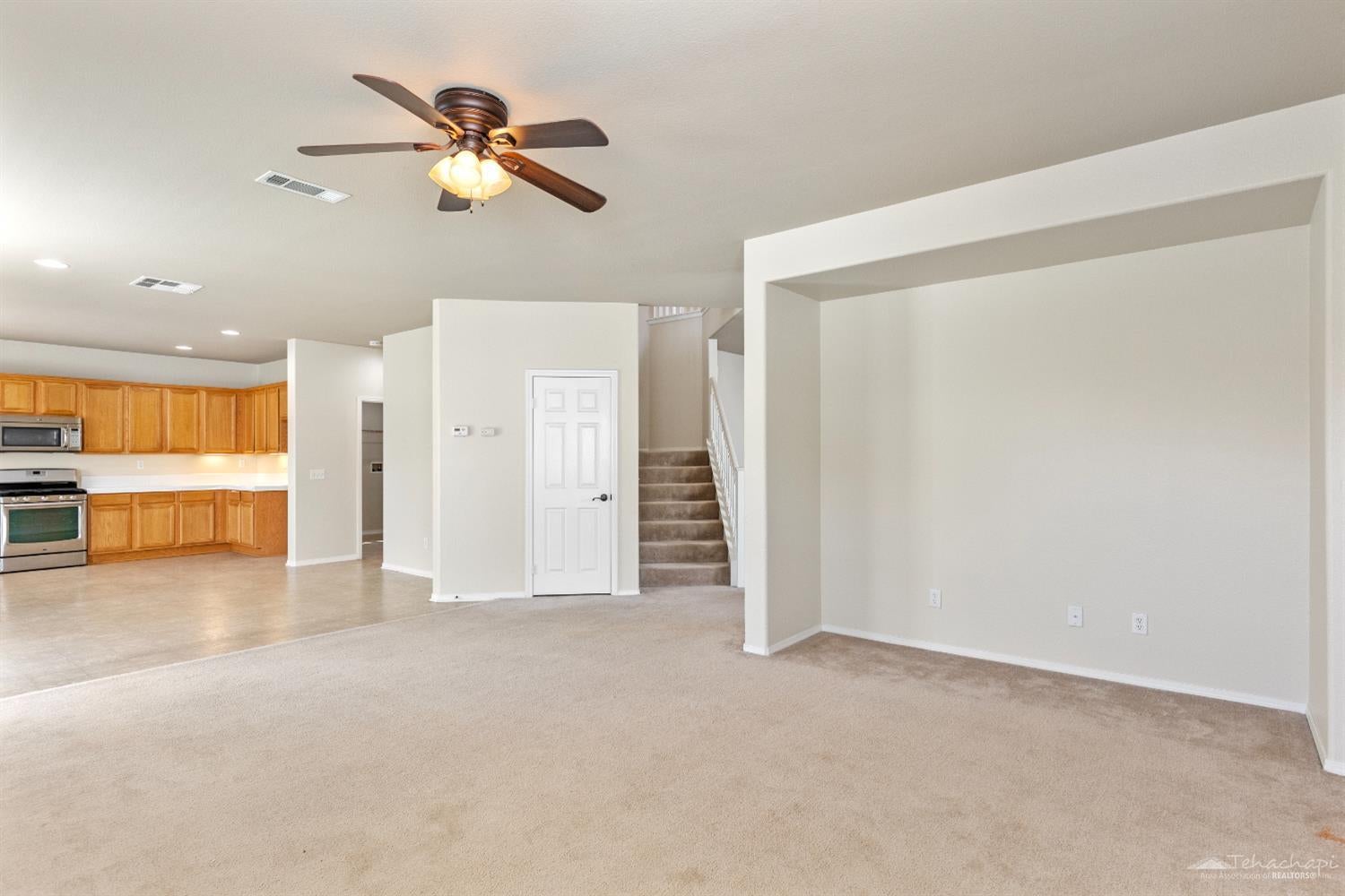1438 Wild Olive Road Tehachapi, CA 93561 - Photo 9 of 55 Rear family room open to kitchen...
