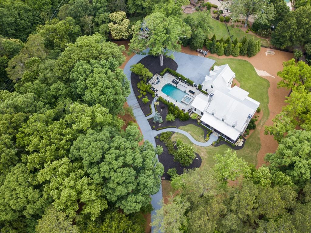 13365 Hopewell Road Alpharetta, GA 30004 - Photo 1 of 1 an aerial view of a house with a yard
