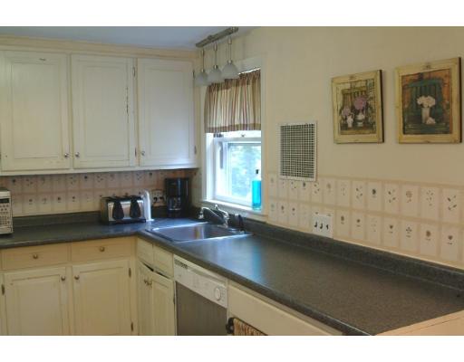 9 Myrna Road Lexington, MA 02420 - Photo 5 of 7 a kitchen with a sink and cabinets