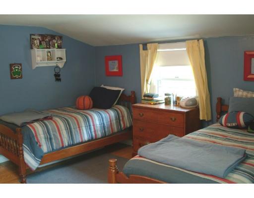 9 Myrna Road Lexington, MA 02420 - Photo 7 of 7 a bedroom with a bed lamp and window