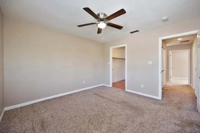 an empty room and closet area