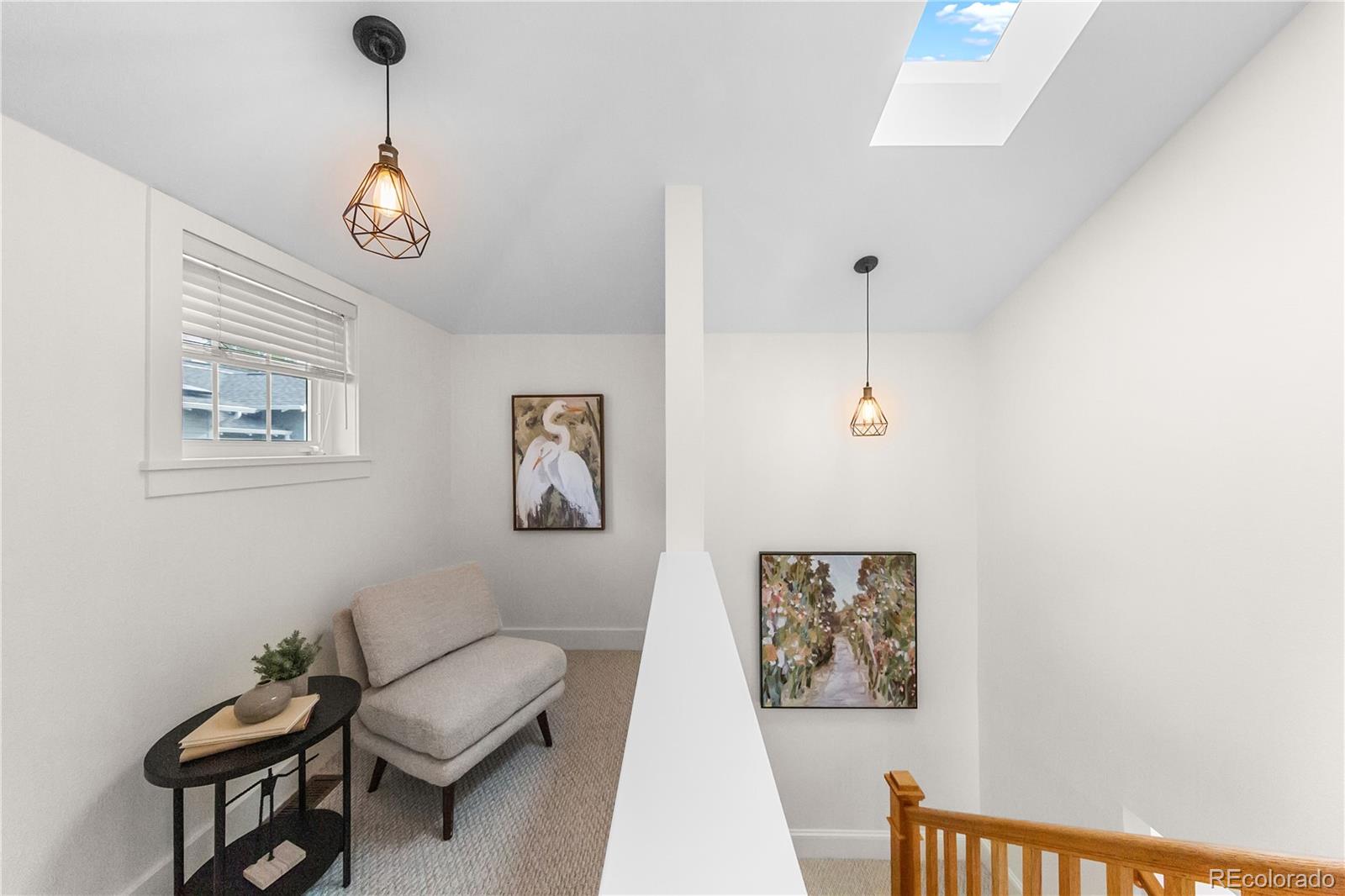 3056 8th Street Boulder, CO 80304 - Photo 14 of 45 a view of a hallway with workspace and a couch