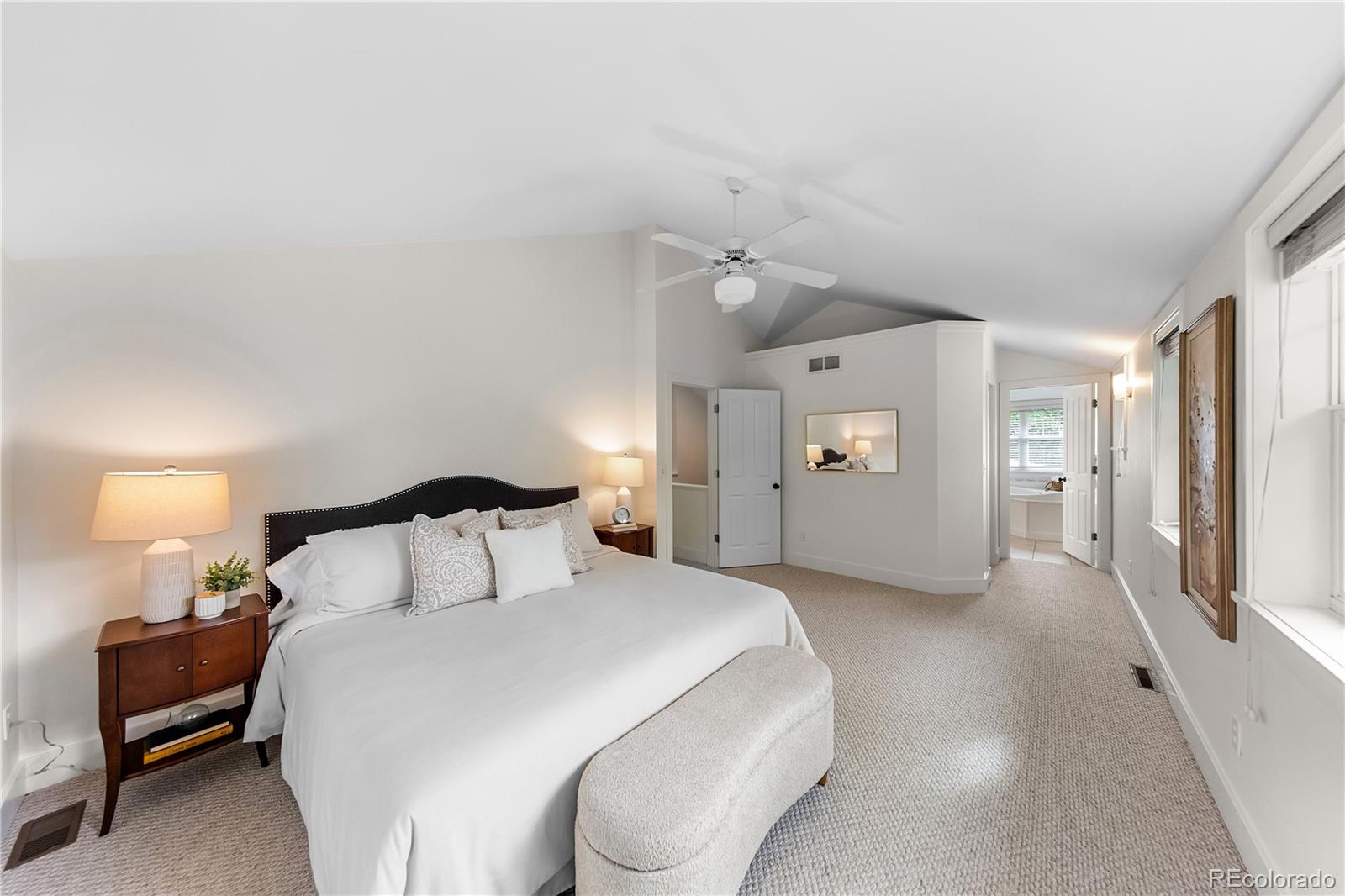 3056 8th Street Boulder, CO 80304 - Photo 15 of 45 a bedroom with a bed and window