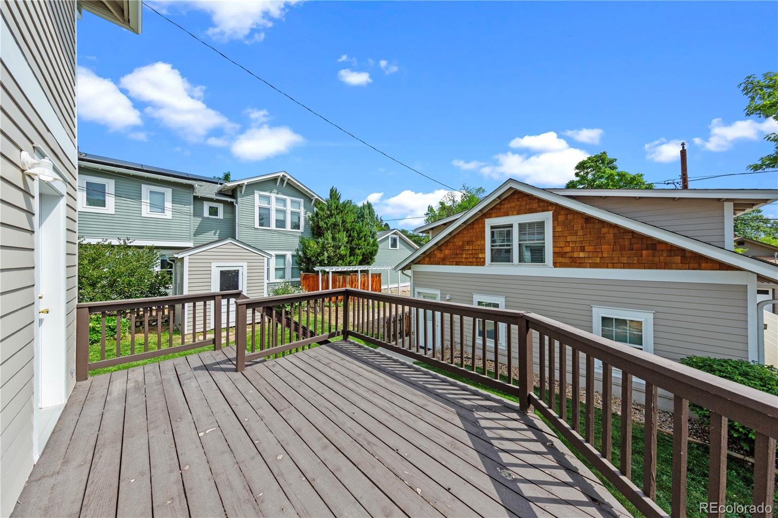 3056 8th Street Boulder, CO 80304 - Photo 25 of 45 a view of a house with wooden deck