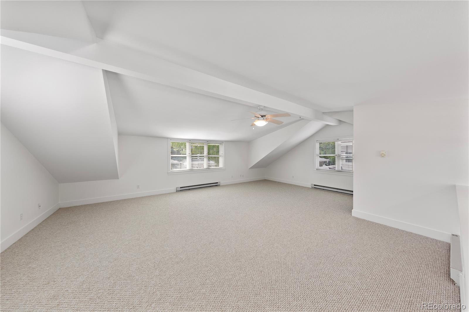 3056 8th Street Boulder, CO 80304 - Photo 30 of 45 an empty room with windows