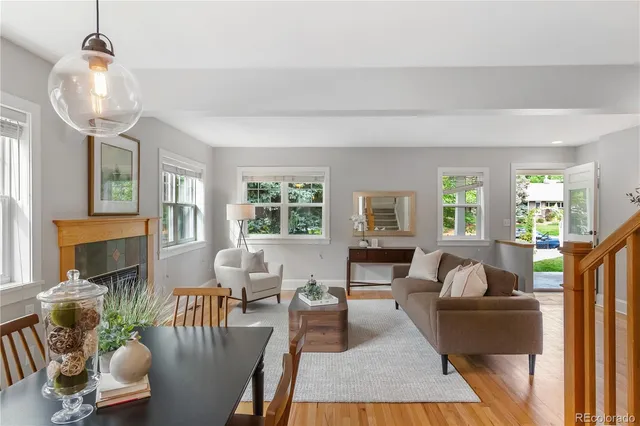 a view of a dining room with furniture window and outside view
