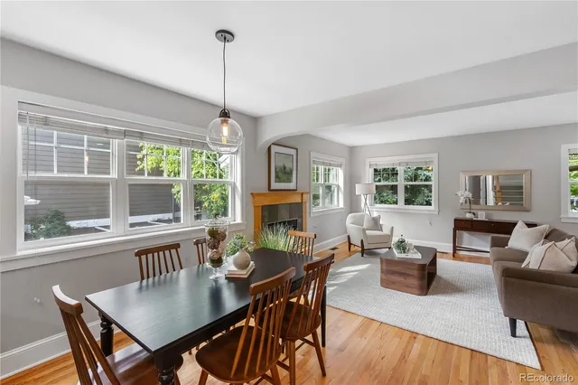 a view of a living room and dining room