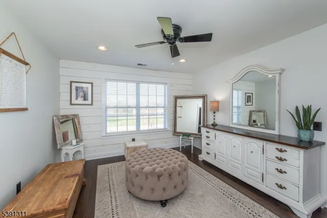 a bed room with a bed and a window