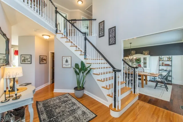 a view of entryway livingroom and hall