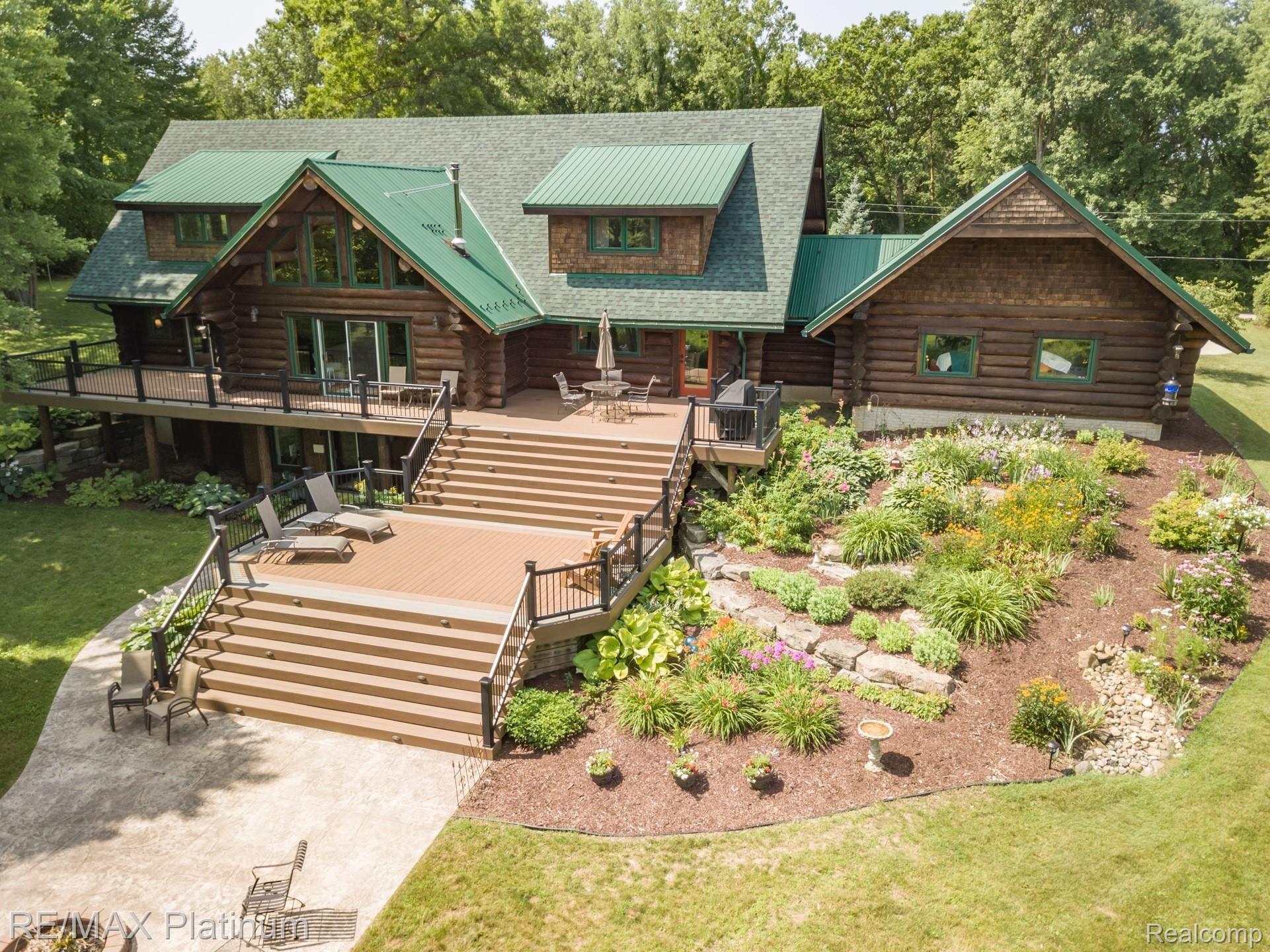 8335 Cedar Lake Road Pinckney, MI 48169 - Photo 25 of 55 Massive Rear Composite Deck, Patio and Gardens