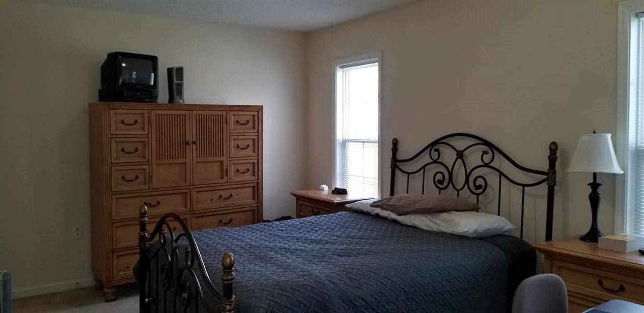 11341 Involute Place, Unit 101 Raleigh, NC 27617 - Photo 11 of 20 This large bedroom includes a walk in closet. Bedroom