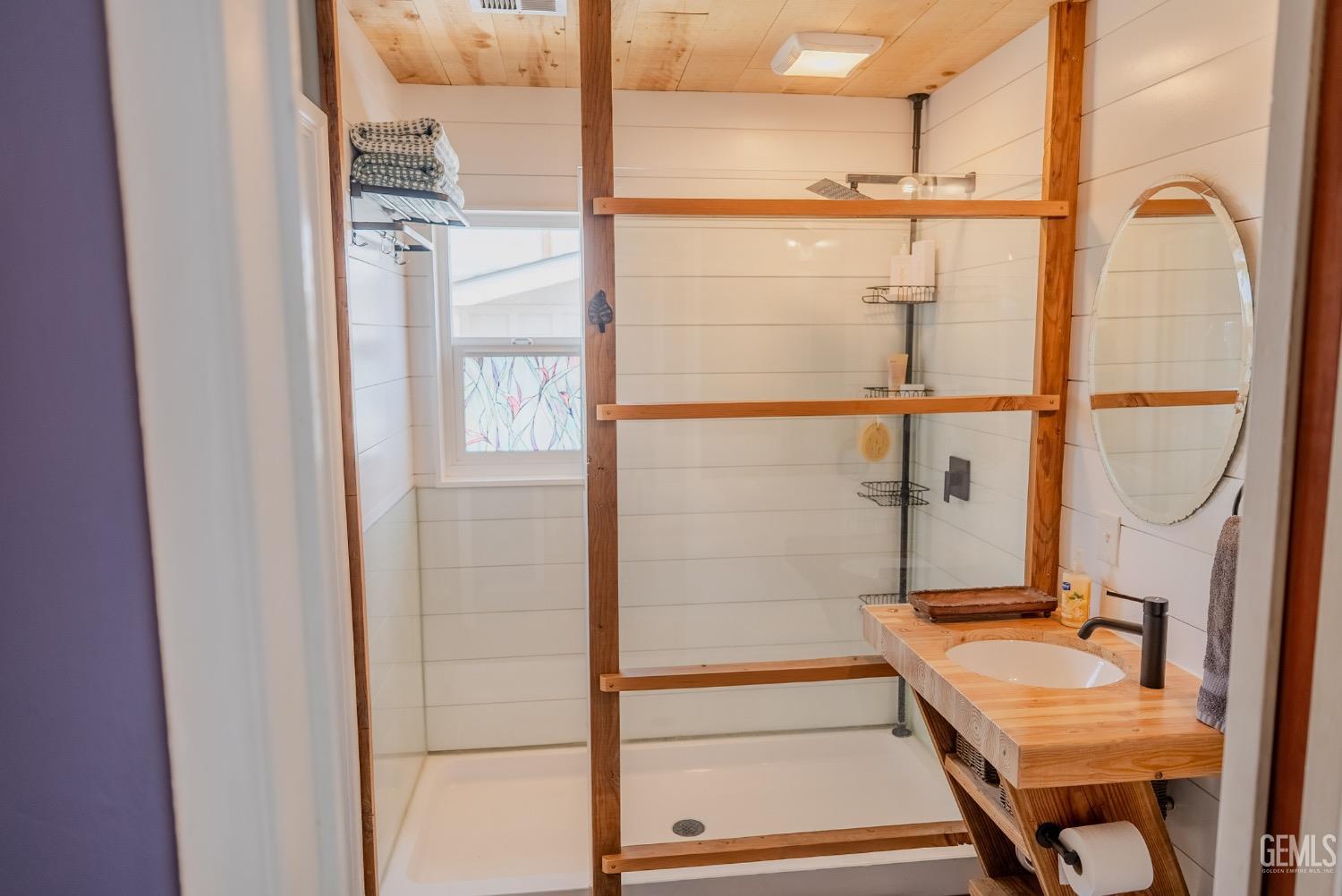 Undisclosed Address Tehachapi, CA 93561 - Photo 23 of 46 a bathroom with a tub and a shower