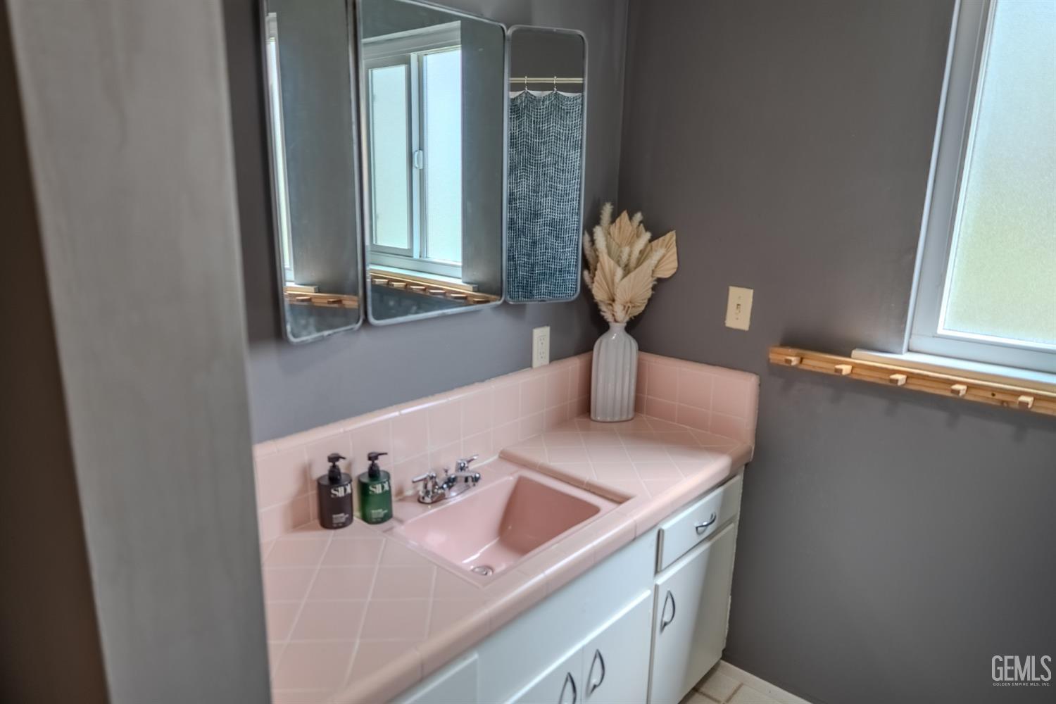 Undisclosed Address Tehachapi, CA 93561 - Photo 24 of 46 a bathroom with a sink and a mirror